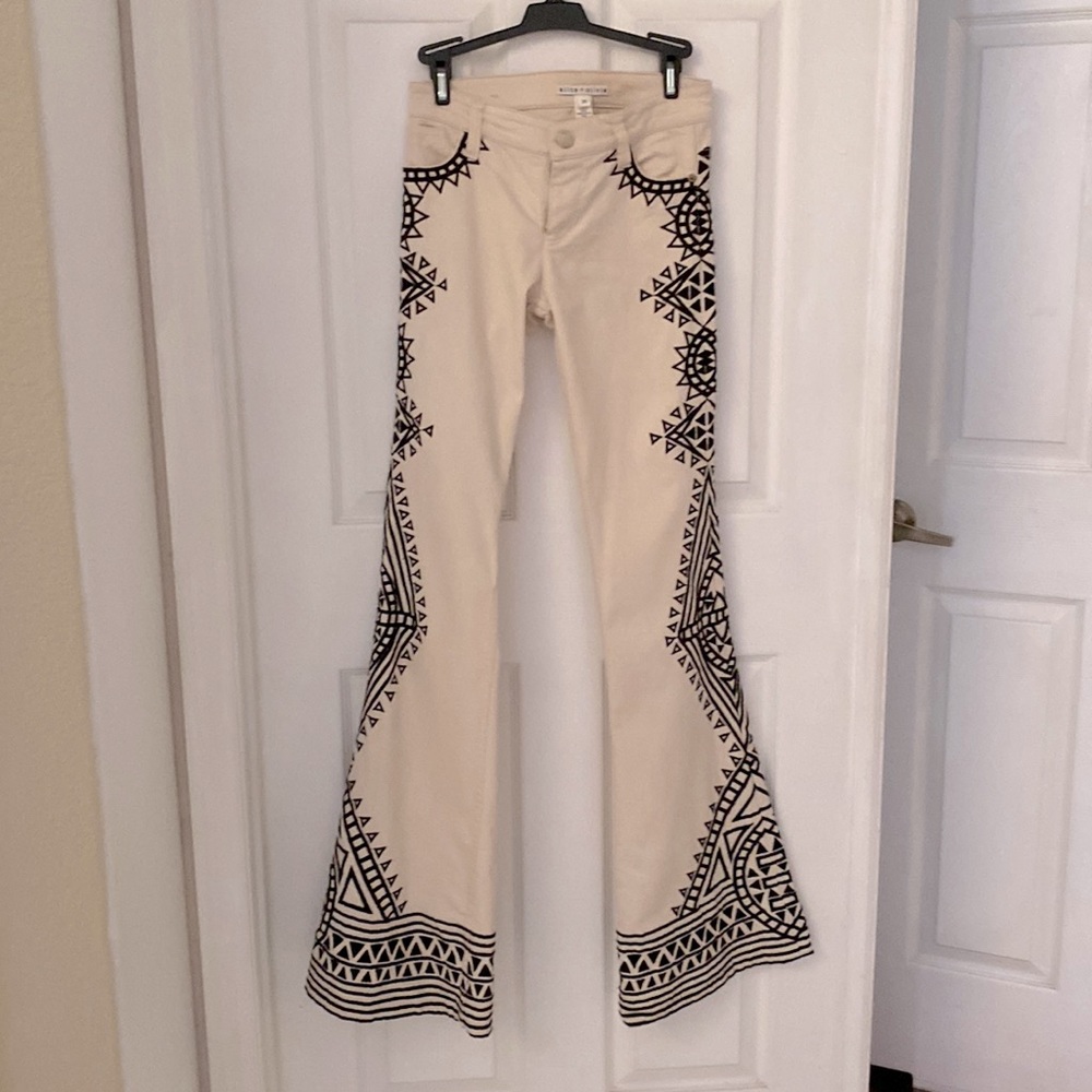 Alice and Olivia Riley Low Rise Embroidered Jeans.